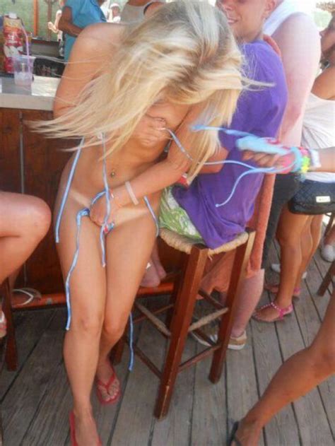 Covering Up Her Nearly Naked Body By The Beach Bar Porn