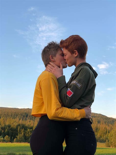 lesbian couple kissing in norway one redhead and a blonde short hair couple poses reference