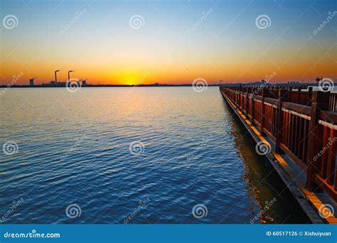 The Lake And Wooden Trestle Sunset Stock Photo Image Of Scenery