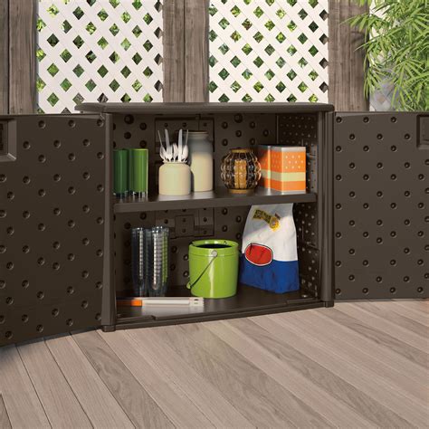 In any style, wicker storage cabinets are sure to be a delightful presence, whether combined with matching wicker furniture pieces or as single accents. Outdoor Resin Wicker Storage Cabinet Shed in Dark Mocha Brown