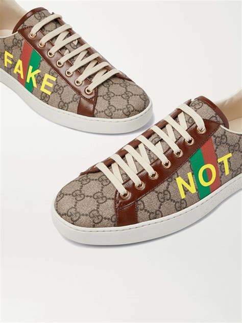 Gucci Ace Printed Leather Trimmed Monogrammed Coated Canvas Sneakers