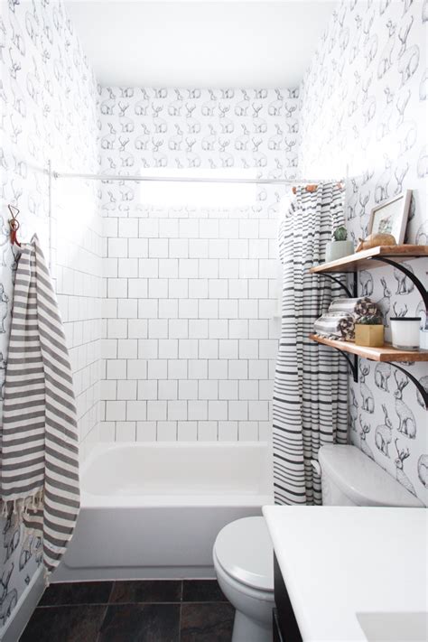 Scrape any excess off to get the surface as smooth as you can. Jackalope Wallpaper Bathroom + DIY Smooth Textured Walls