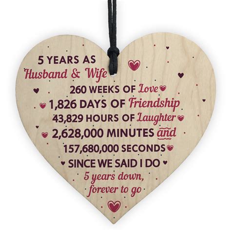 Popular wedding anniversary gifts for the 1st year anniversary with a paper theme are: 5th Wedding Anniversary Gift Heart Wedding Anniversary Gift