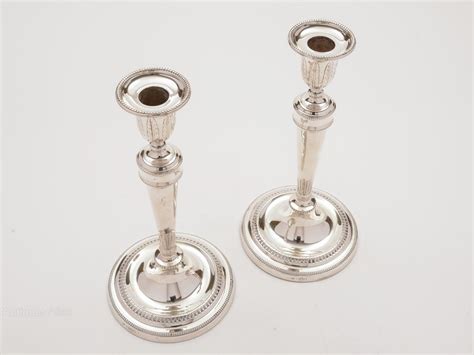 Antiques Atlas Pair Of Tall Silver Candlesticks London 1912
