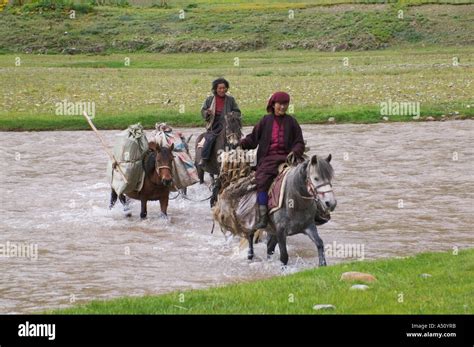 Tibetan Riding On Horse To Cross The Lancang River Chamdo Area Tibet
