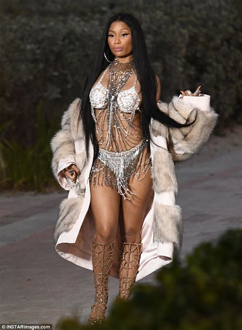 Nicki Minaj Flashes Underboob In Bikini On Miami Beach Set Daily Mail