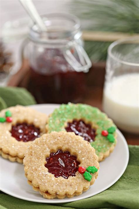 Austrian jam cookie for cathematics as part of reward for guessing my age on fun forum thread. Linzer Cookies from Austria by Elizabeth LaBau | Christmas baking, Jam cookies, Christmas cookie ...