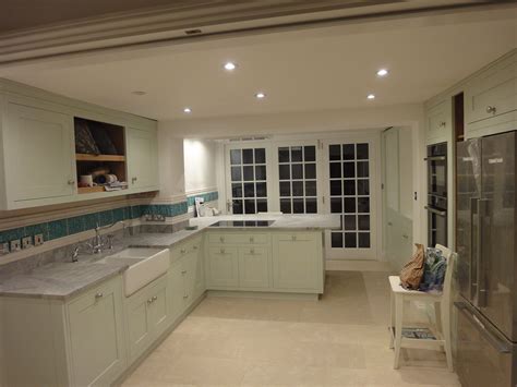 Worktops and appliances are not included. Traditional, Shaker kitchen with grey granite worktops.