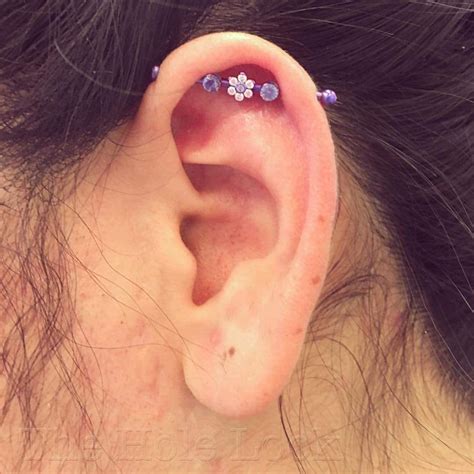 Absolute Stylish Blue And Stone Based Design Of Earring Piercings
