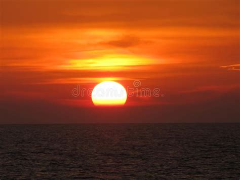Beautiful Red Sunset Over The Ocean Bright Sunset With Large Yellow