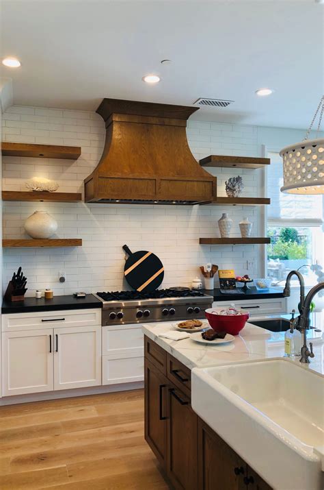 Beautiful Stained Range Hood And Floating Shelves With Contrasting