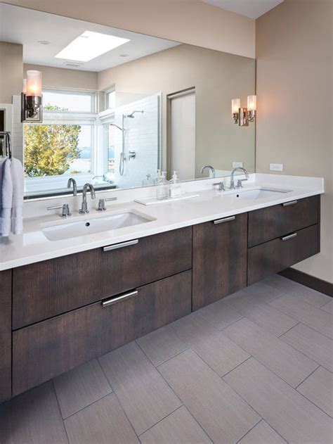 The area that was the toilet is being reframed to be included into the bathroom and will be a shower that will be double the size of the current shower. Floating Vanity Cabinet | Houzz