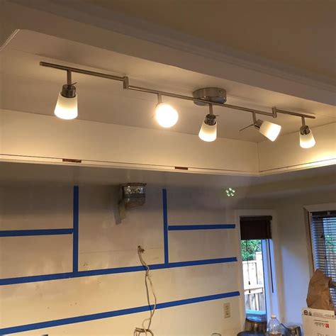 See your kitchen in a whole new light with new kitchen lighting from the home depot. Old fluorescent light box is now planked and new LED ...