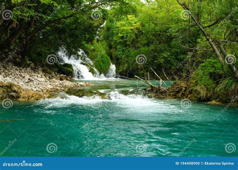 Waterfall And Turquoise Stream In The Forest Stock Photo Image Of
