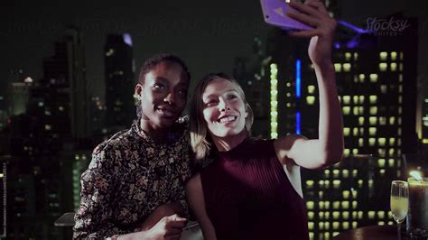 Girlfriends Having Fun And Taking A Selfie By Stocksy Contributor