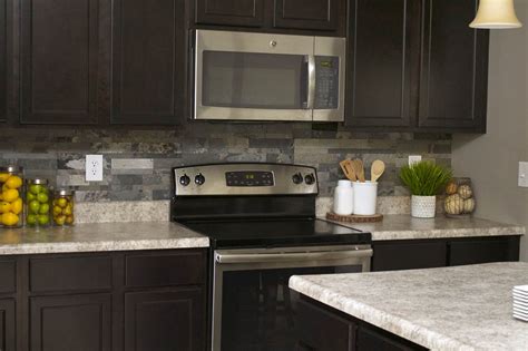 I hope you'll enjoy this small project. Faux Stone Kitchen Backsplash - How to Nest for Less™