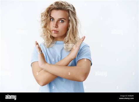 Not Even Think About It Portrait Of Serious Looking Displeased And Intense Bossy Blond Female