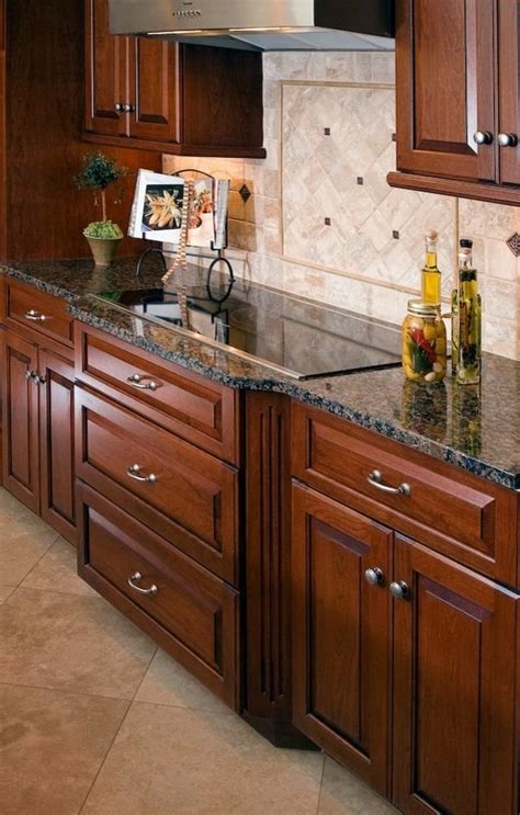 Wood Kitchen Cabinets Baltic Brown Granite Countertop Tile Backsplash