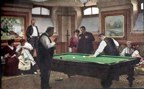 A Pool Table In Front Of A Group Of People