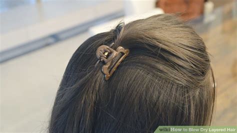 Brush your hair properly to detangle the knots. 3 Ways to Blow Dry Layered Hair - wikiHow
