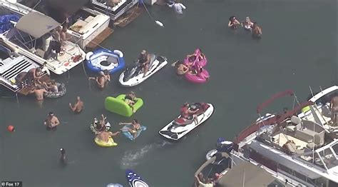 Out Of Control Lake Party As Hundreds Of Boaters Without Masks Gather Off Sandbar Island In