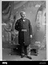 David B. Henderson, full-length portrait, standing with one arm behind ...