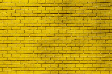 Yellow Wall Paint Bricks Hd Wallpaper Wallpaperbetter