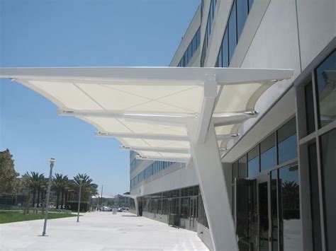 6.design foundations and provide adequate uplift safety factor (not less that 1.5). awning canopy design | Entrance Canopy - Southern ...