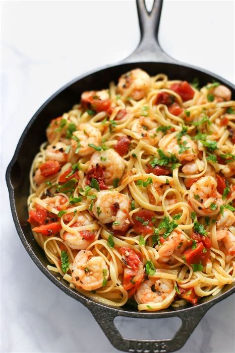 Simple and delicious seafood pasta dish , you can use scallops and lobster instead of shrimp and calamari , or just mix and match. Shrimp Fettuccine with White Wine Tomato Sauce | Recipe ...