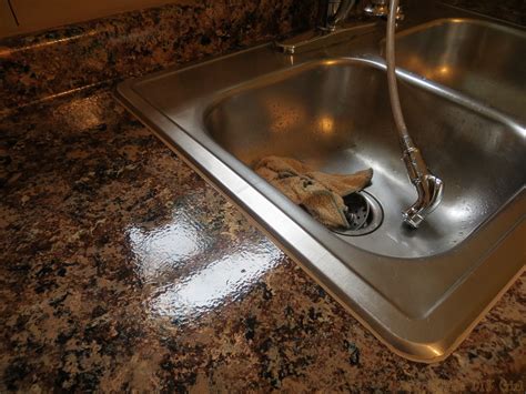 Get the information you need now. Caulking sink after Giani Granite Paint - The DIY Girl