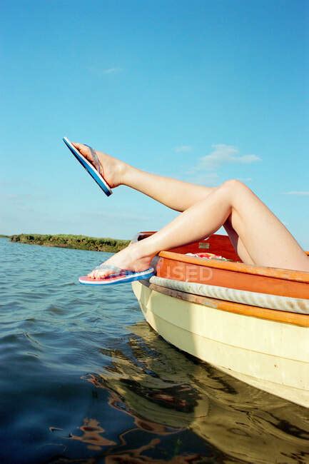 Sunbathing On A Boat Flip Flop Female Stock Photo 169040130