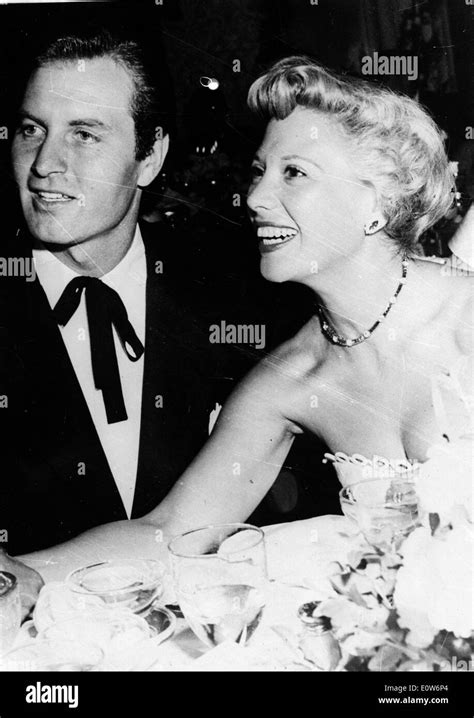 Singer Dinah Shore At A Dinner With Husband George Montgomery Stock