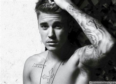 Justin Bieber Shares Sexy Photo Amid Report He Threatens To Sue Over
