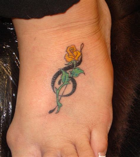 Treble Clef And Rose Tattoo Foot Tattoo Design Tattoomagz