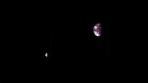 Perseverance rover lowered on to surface of mars. Mars-eye view of Earth and the Moon