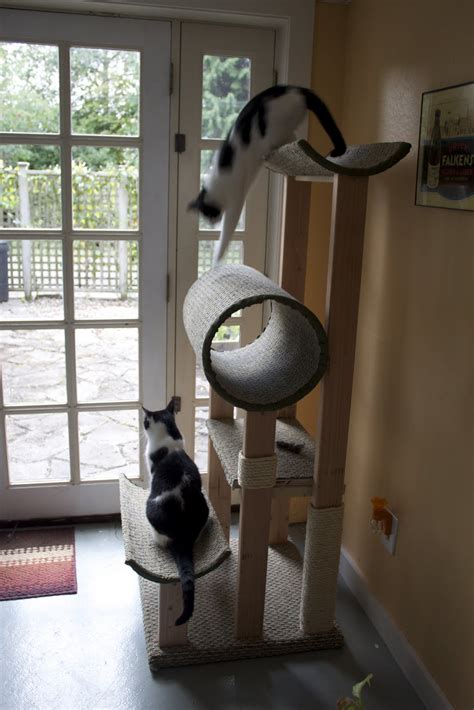 Free cat tree plans and cat furniture ideas to help you build a cool cat room for your kitties to keep them happy, healthy and out of trouble. Homemade Cat Posts, Trees, and Houses