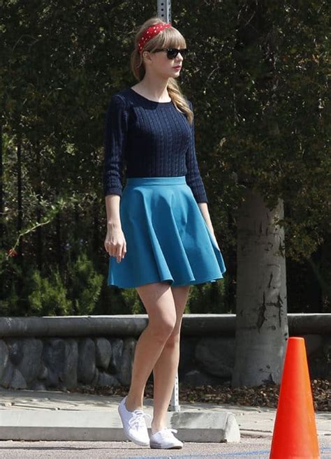 Retro Taylor Swift Wears Cute Flared Mini Skirt And Cable Knit Sweater