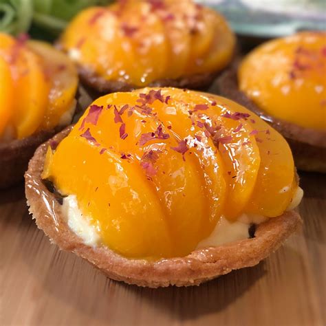 peach fruit tart with a smooth custard filling sherbakes