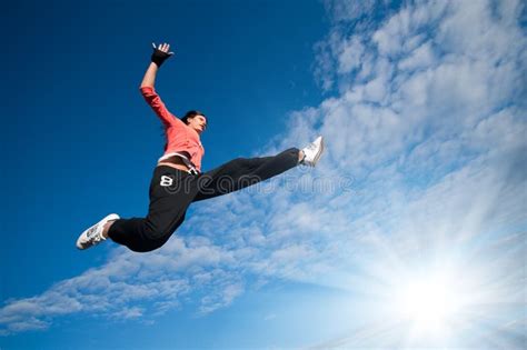 Sport Woman Jumping And Fly Over Sky And Sun Stock Images Image 17062724