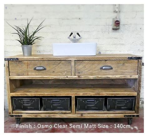 An Old Wooden Cabinet With Drawers And A Sink On Its Side In Front Of