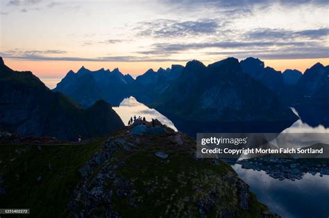 Aerial View Of Mountains Overlooking A Fjord In Reine Norway High Res