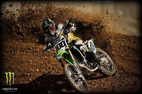 Download Fox Dirt Bike Motocross Racing On Mud Wallpaper
