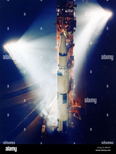 Nasa Saturn V Rocket On Launch Pad Bathed In Lights Stock Photo
