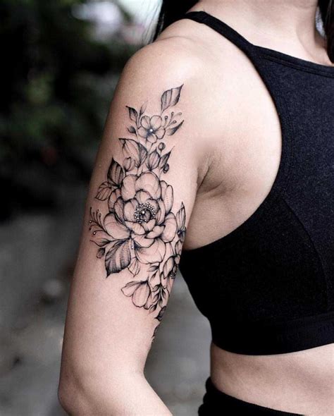 A Black Floral Piece On The Right Upper Arm Tattoos For Women Half Sleeve Unique Half Sleeve