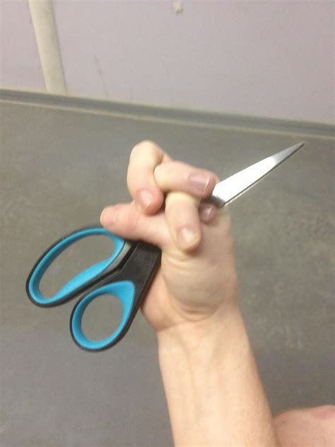 Proper Way To Hold Scissors