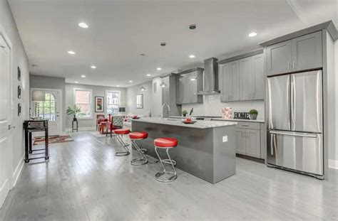 Though this kitchen's range and cabinets are both white, one has brass. 30 Gray and White Kitchen Ideas - Designing Idea