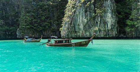 Hd Wallpaper Brown Row Boat Near Rocky Mountain Thailand Phuket Koh Phi Phi Wallpaper Flare