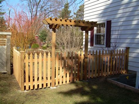 This white picket fence has charm on its own, but the. Wood Fence in St Paul, Lakeville, Twin Cities, Woodbury ...