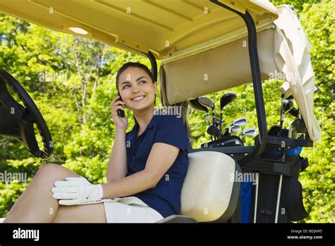 Woman In Golf Cart Stock Photo Alamy
