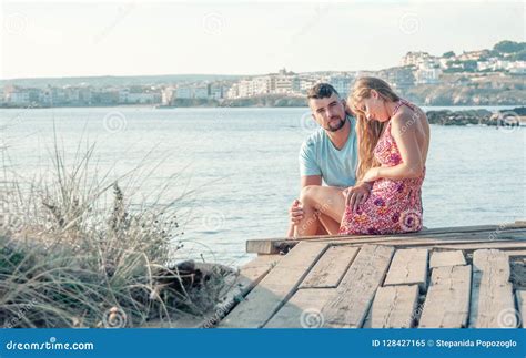 Romantic Young Couple On The Beach Young Couple Enjoy Each Other On Vacation Stock Image